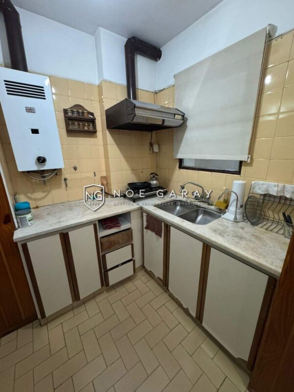 Dpto en venta a metros de la Peatonal de Carlos Paz con balcon y cochera - Imagen 4
