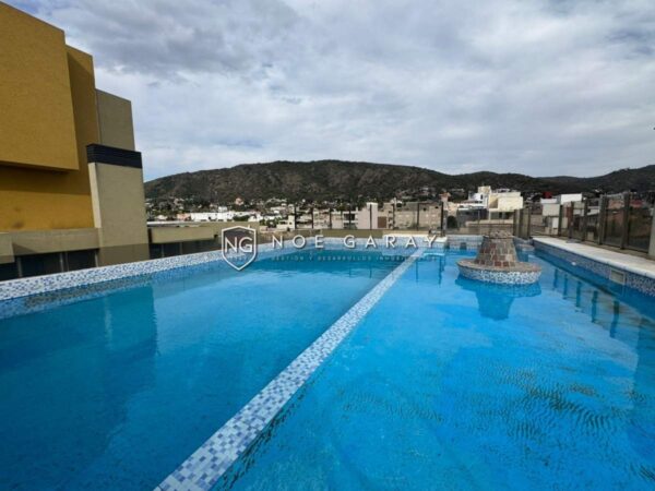 Departamento en venta con patio propio, cochera y pileta - Imagen 12