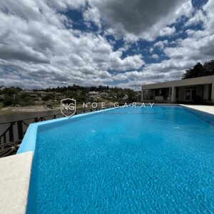 Dpto en alquiler temporario con bajada al lago