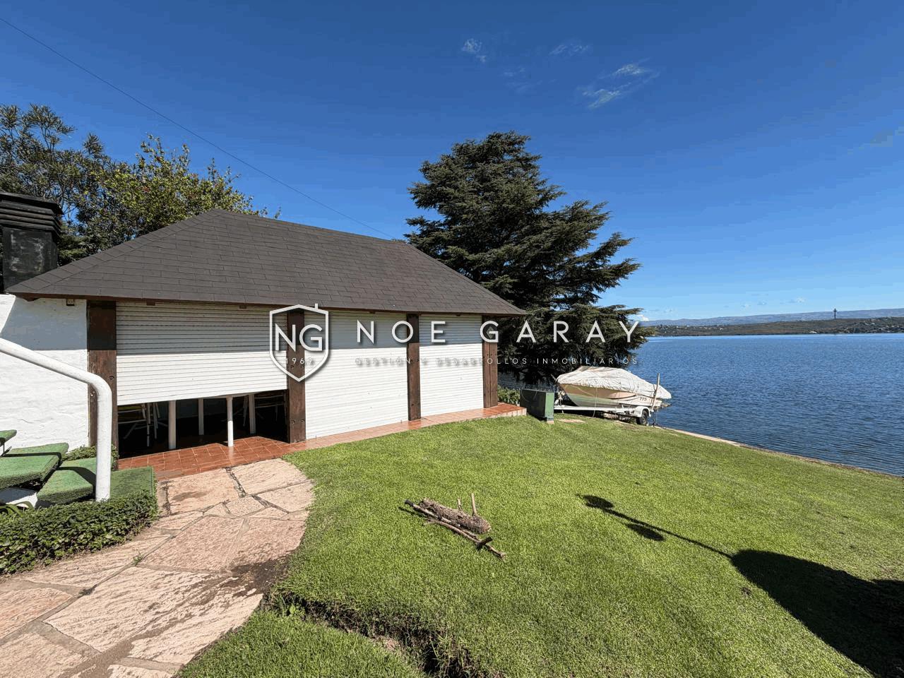 DEPARTAMENTO EN VENTA CON BAJADA AL LAGO EN CARLOS PAZ - Imagen 28